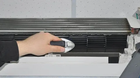 Outdoor unit maintenance during AC coil cleaning service for better cooling